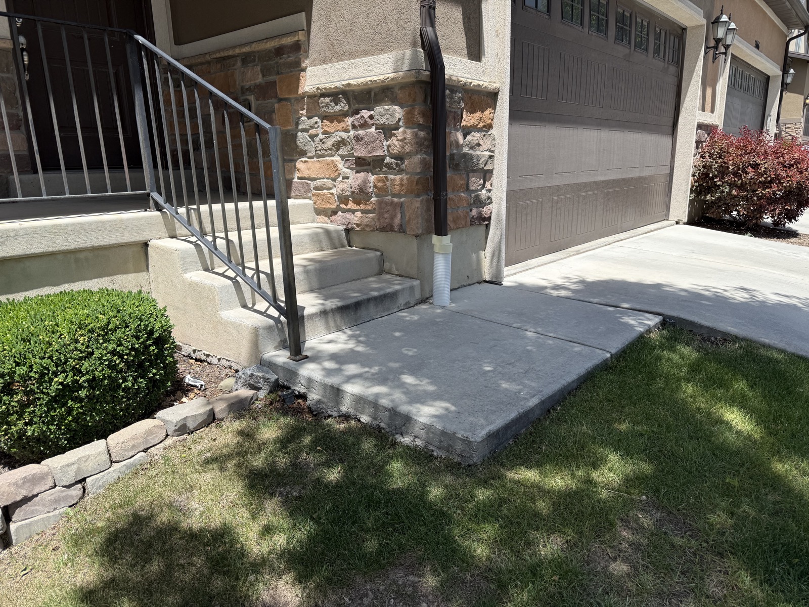 Raised, level front entry pad after lifting, Lehi