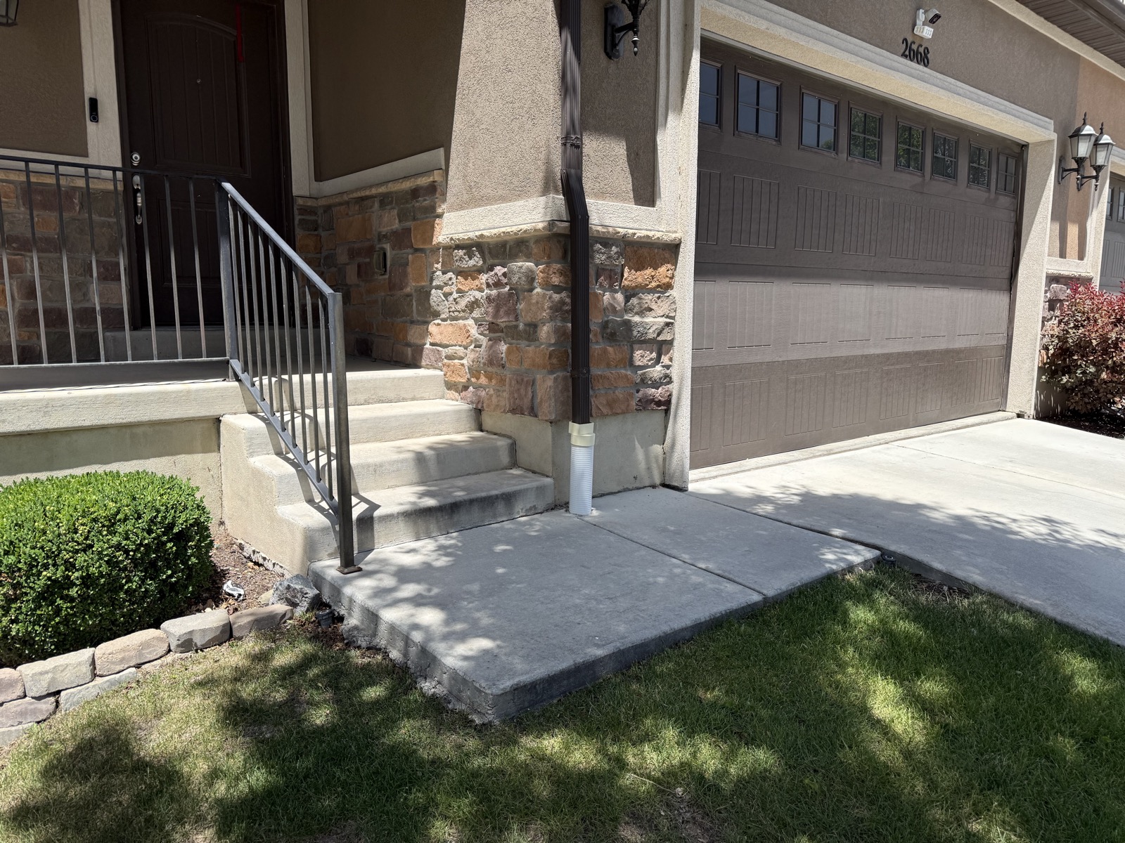 Settled front entry pad before lifting, Lehi